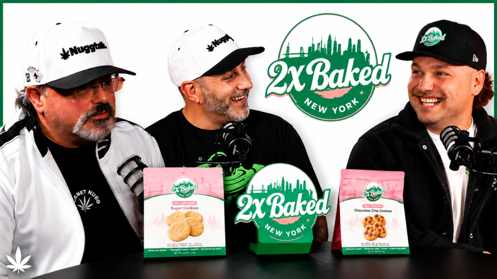 Three men wearing branded hats sit behind microphones during a podcast recording, with 2X Baked logos and packaged cookie products displayed on a table against a white background.